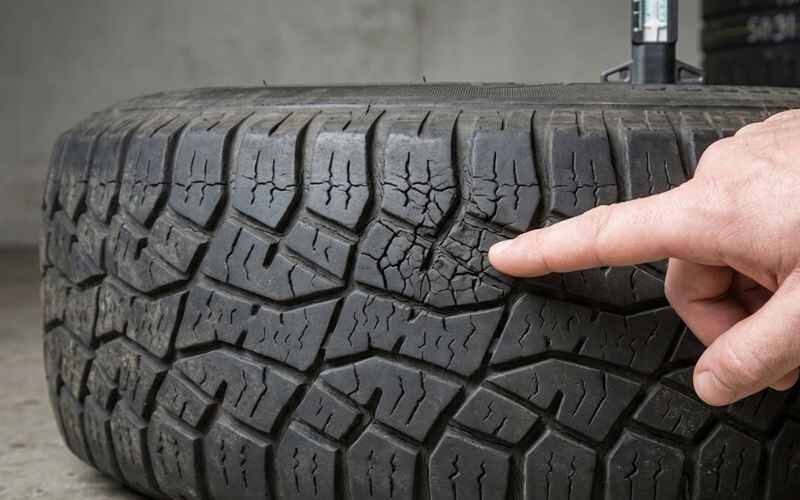 Cupped tire wear caused by bad car suspension and worn shocks